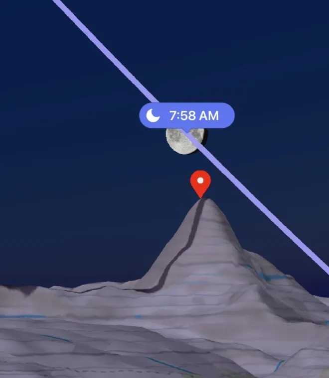 Sunrise: the moon nearing the summit